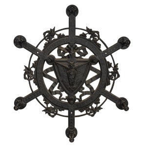 An antique English cast iron wall mount hat rack with owl decoration, late 19th century, 85cm high, 85cm wide.