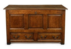 An antique English oak mule chest with peg-joint construction, two lower drawers and fielded panel front, first half of the 18th century, 83cm high, 140cm wide, 54cm deep. PROVENANCE: Purchased by the current vendor from John Wilson Antiques for $6,250. Purchase documentation included.