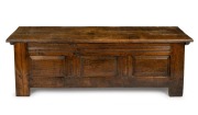 An antique provincial English oak coffer with peg-joint fielded panel construction, 18th century, 56cm high, 176cm wide, 58cm deep. PROVENANCE: Purchased by the current vendor from John Wilson Antiques in 2008 for $4,900. Purchase documentation included.