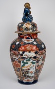 An antique Japanese Imari porcelain lidded urn with foo dog top, Meiji period, 19th century, 73cm high. - 2