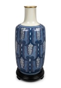 SEVRES blue and gilt French porcelain Art Deco vase, designed by Adrien-Auguste LeDuc, circa 1931, black factory mark to base "Sevres Manufacture Nationale, France" and signed by the designer, 36cm high.