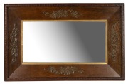 An antique oak framed mirror with applied flannel flower decoration, early 20th century, 85 x 55cm overall.