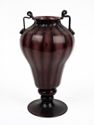 An Italian purple glass two handled vase, early to mid 20th century, 27cm high.