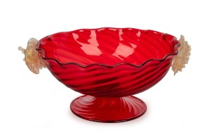 A vintage ruby Murano glass fruit bowl with applied grape decoration, mid 20th century, circular blue foil to base "Murano Glass, Made In Italy", 13.5cm high, 34cm wide.