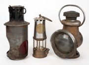 An antique coach lantern; together with an antique signal lantern and an ECCLES "Protector" lamp, 19th/20th century, (3 items), the largest 30cm high.