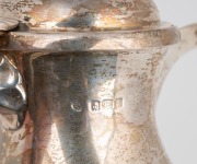 A sterling silver jug with carved timber handle and finial, made in Sheffield, early 20th century, 17cm high, 422 grams total including handle and finial. - 2