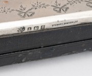 An antique sterling silver mounted desk calendar; together with an antique sterling silver pocket watch holder, 20th century, (2 items), the calendar 21cm wide. - 2