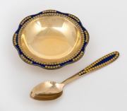 A Russian silver bowl and spoon with enamel decoration and original gilt finish, stamped "916" with Soviet assay mark and Cyrillic maker's mark, (2 items), the bowl 8.5cm wide, 82 grams total.