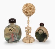 A Chinese carved ivory puzzle ball on stand; together with two glass scent bottles, early to mid 20th century, (3 items), the puzzle balls 14cm high.