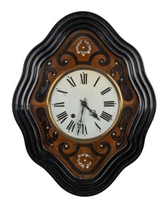 An antique French wall clock in shaped ebonised case, eight day time and strike movement with Roman numerals, 19th century, 62cm high overall.