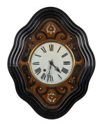 An antique French wall clock in shaped ebonised case, eight day time and strike movement with Roman numerals, 19th century, 62cm high overall.