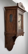 An antique German oak cased wall clock with time and strike movement, silvered dial with Arabic numerals, early 20th century, 55cm high. - 2