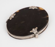 An antique silver mounted tortoise shell folding magnifying glass, 19th century, 8.5cm high when closed. - 2