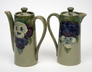 MOORCROFT rare and early "Pansy" pattern teapot and companion hot water pot on celadon green ground, (2 items), both impressed "MOORCROFT BURSLEM" with green signature "W. Moorcroft", ​​​​​​​15.5cm high. - 2