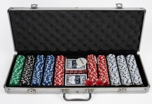 Poker gaming chip set in original cargo case, 20th century, the case 38cm wide.