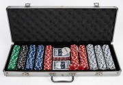 Poker gaming chip set in original cargo case, 20th century, the case 38cm wide.
