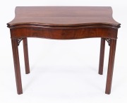 An antique English Chippendale period serpentine fronted mahogany card table with wool lined gaming surface and concertina action support, circa 1770, 74cm high, 94cm wide, 47cm deep. - 4