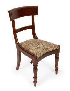 A Colonial cedar side chair with concave front rail, faceted front legs, upholstered drop-in seat and well figured tablet back top rail, Tasmanian origin, circa 1840, 89cm high, 46cm across.