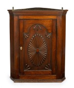 A rare and early Colonial Tasmanian hanging corner cupboard, most likely a government commission, circa 1825.