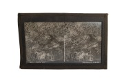 WWII ALLIED BOMBING RAIDS: A tabletop stereoscope, height 52.5cm, purported to have been owned by Royal Air Force Marshal Arthur Harris, loaded with 50 stereo transparencies (dated 1943-45) on chain drive operated by external knob; views mostly show the d - 4