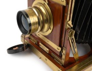 THORNTON-PICKARD: "Imperial" triple-extension view camera, late 19th century, plate dimensions 12 x 16.5cm, with rare Voigtl&auml;nder & Sohn Collinear II f5.4 No. 4 brass lens and "Baker & Rouse" retailer's inlay. - 4