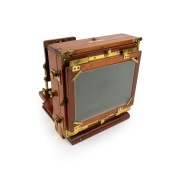 LANCASTER: "Instantograph" view camera, late 19th century, plate dimensions 11.5 x 16.5cm, fixed-aperture Lancaster brass lens, burgundy bellows, unusual rear hinge mechanism. - 4