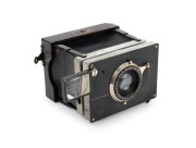 ZULAUF: 1908 "Bebe" strut-folding camera [#1352], plate dimensions 6 x 4cm, Carl Zeiss Jena Tessar 75mm f4.5 lens [#152911], folding Newton finder.