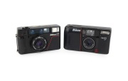 NIPPON KOGAKU: Pair of 1980s plastic point-and-shoot cameras, comprising Nikon L35 AF and Nikon TW20 AF. (2 items)