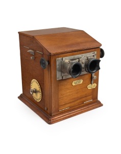 "Le Taxiphote" c. 1899 tabletop stereoscope by Jules Richard (Paris), height approx. 17cm, adjustable focus, internal crank-operated distributor for cycling through up to 25 pre-loaded stereo glass transparencies, with integrated external counter.