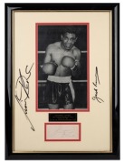 LIONEL ROSE framed photographic display with strong signature on piece and additionally signed on the glass, ​​​​​​​56 x 42cm overall.