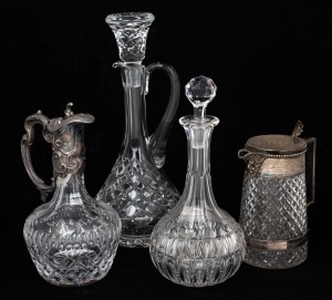 Two crystal claret jugs with silver plated mounts; together with a cut crystal decanter and wine ewer, 19th and 20th century, (4 items), ​​​​​​​the largest 38cm high.