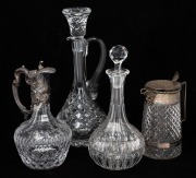 Two crystal claret jugs with silver plated mounts; together with a cut crystal decanter and wine ewer, 19th and 20th century, (4 items), ​​​​​​​the largest 38cm high.