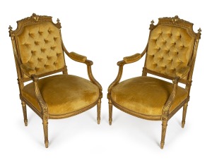 A pair of antique French Louis XVI style gilded armchairs with handsome carved decoration and gold velvet upholstery, 19th century, ​​​​​​​100cm high, 61cm across the arms.