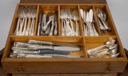 CHRISTOFLE "Marly" pattern French silver plated cutlery in canteen resting on a cabriole leg table. - 3