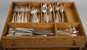 CHRISTOFLE "Marly" pattern French silver plated cutlery in canteen resting on a cabriole leg table. - 4