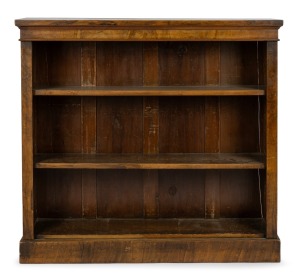 An antique English burr walnut free standing open front bookcase, bearing original retailer's plaque "Jas. Shoolbred & Co... London", 19th century, 112cm high, 122cm wide, 29cm deep.