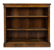 An antique English burr walnut free standing open front bookcase, bearing original retailer's plaque "Jas. Shoolbred & Co... London", 19th century, 112cm high, 122cm wide, 29cm deep.