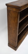 An antique English burr walnut free standing open front bookcase, bearing original retailer's plaque "Jas. Shoolbred & Co... London", 19th century, 112cm high, 122cm wide, 29cm deep. - 3