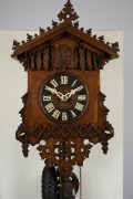 An antique German Black Forest cuckoo wall clock in carved and fretted oak gothic style case, fretted bone hands, 30 hour wood plate movement striking the hour and half hour on a coil gong, circa 1875, 45cm high, 26cm wide. - 2