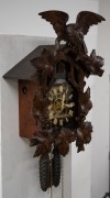 An antique German Black Forest cuckoo wall clock in carved linden adorned with vine leaf decoration and spread eagle finial, later fitted transparent dial plate displaying the fretted brass plate 30 hour movement, cuckoo and bellows. Fancy carved bone han - 4