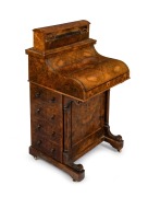 An antique English burr walnut piano top Davenport, 19th century, 100cm high (top open), 59cm wide, 54cm deep.