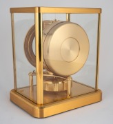JAEGER LECOULTRE "ATMOS" table clock (calibre 540), in gilt brass case, with skeletonized movement, white chapter ring, baton numerals, ​​​​​​​23cm high. - 5