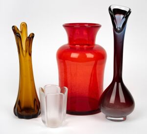 Four assorted vintage coloured glass vases, including ruby glass, Scandinavian etc., the largest 32cm high.