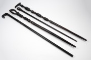 Four assorted carved ebony walking sticks, Indian, Papua New Guinea and Pacific Islands, 20th century, the largest 95cm long. - 2