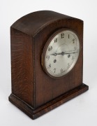 A German oak cased table clock with two train time and strike movement, silvered dial with Arabic numerals, early to mid 20th century, 28cm high. - 2