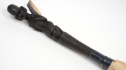 An African tribal fly whisk; together with a carved wood and bone elephant bridge ornament, (2 items), the bridge 59cm long. - 2