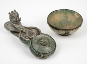 A Chinese carved jade dragon brush washer crafted in the archaic style, together with a jade bowl with metal mount, 20th century, (2 items), 19.5cm long and 11cm diameter.