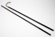 Two antique walking sticks with silver tops and ebonised shafts, one example with brass ferrule and the other missing, 19th/20th century, 90cm and 91cm high. - 2