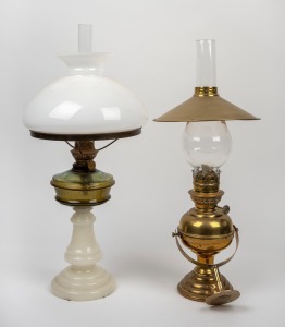 Two antique oil lamps with glass and brass shades, including one example with wall mount bracket, 20th century, 53cm and 55cm high.
