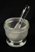 An Italian glass pharmaceutical mortar and pestle, 20th century, 12cm high, 14cm diameter.